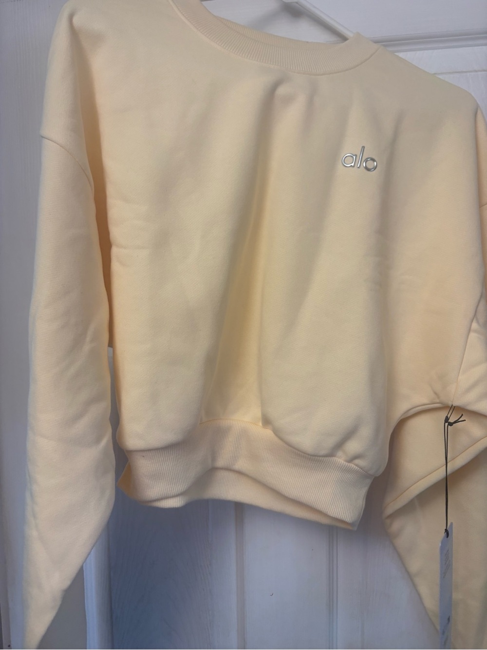 Alo Cropped Accolade Crewneck Sweatshirt in Soft Pale Yellow - Picture 4 of 7